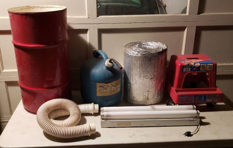 lot 2643 image: Lot of Garage Items - Mechanics Roller Seat, Kerosene 5 gal. Jug, Metal Barrel, and 24 in. Light