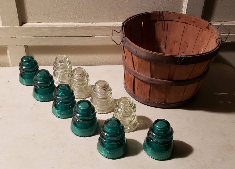 lot 2644 image: Lot of Green & Clear Telephone Lines Insulators (10) - some have chips or cracks - basket included