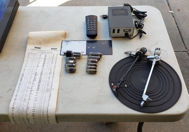 lot 2669 image: Various Electronic Parts - Vintage Tubes and testing chart, Turntable Arms, and Realistic WT-117PS