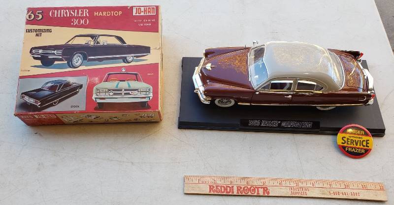 lot 2672 image: 1953 Kaiser Manhattan Die Cast Model (Drivers mirror broke off) and 1965 Chrysler 300 model kit by Jo-Han
