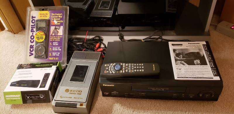 lot 2674 image: Lot of Panasonic 4 head VHS wRemote, Kinyo VHS rewinder, VCR Co-Pilot, and Koramzi Digital TV converter Box