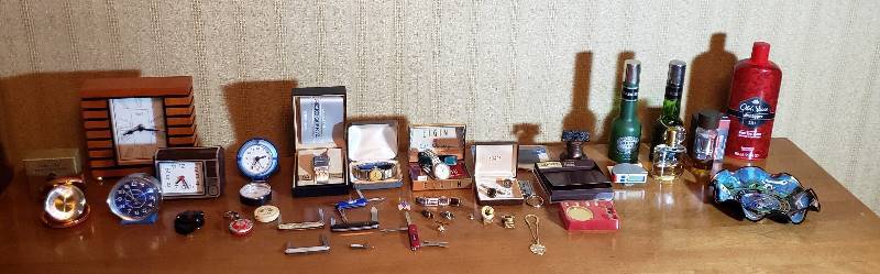lot 2732 image: Lot of Mens Items - Clocks, Watches, Pocket knives, Accessories, Cologne, Wallet, and Soaps
