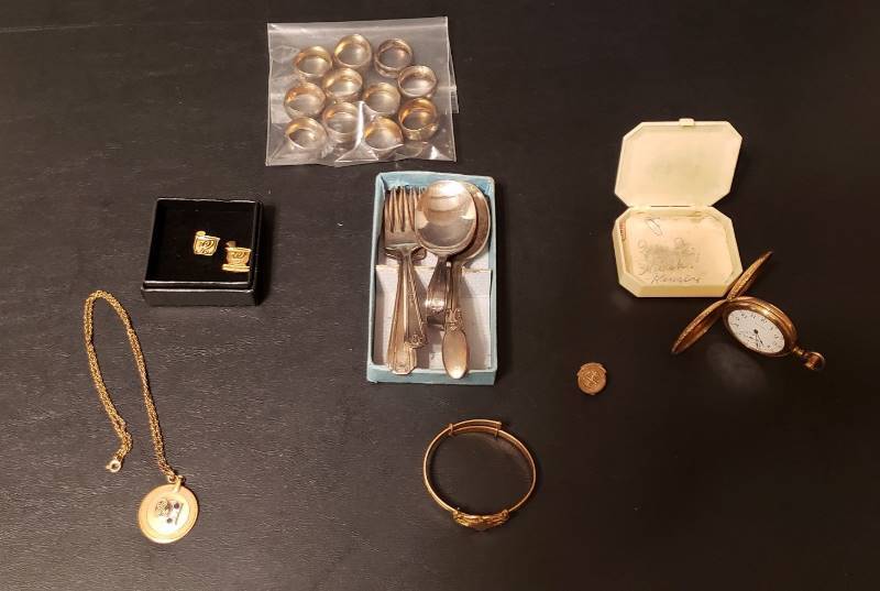 lot 2746 image: Lot of Jewelry - Gold Plated Watch, 120 12K Gold Filled Necklace, Walgreen Service Year Pins, Kids Utensils, and Perfume Bottle Rings