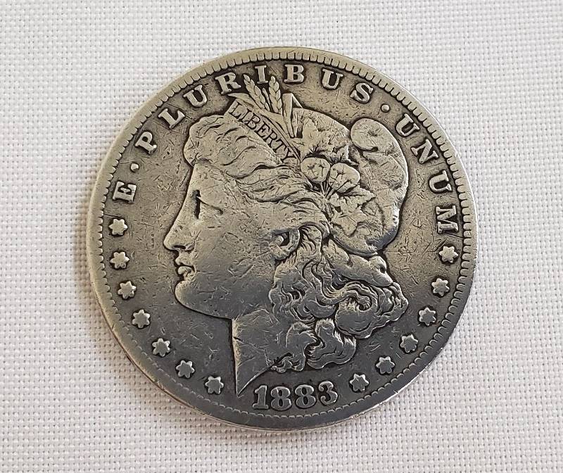 lot 2779 image: 1883 S Morgan Silver Dollar