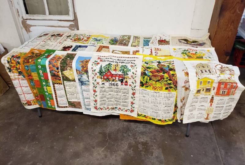 lot 2930 image: Lot of (33) Vintage Linen Calendar Year Tea Towels
