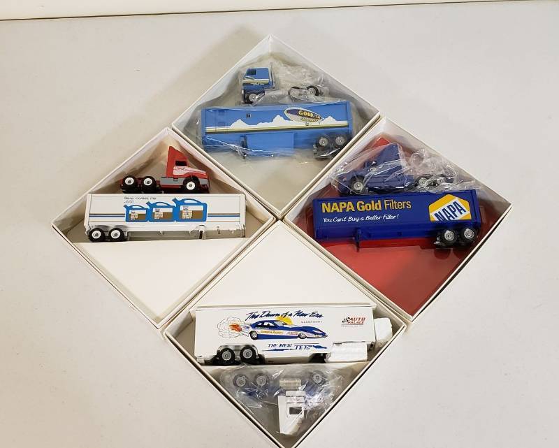 lot 2943 image: Lot of Winross Trucks - Automotive Products Trucks - 4 total