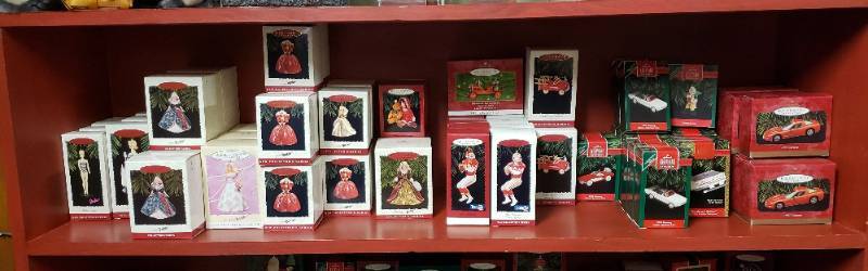 lot 2981 image: Lot of Hallmark Keepsake Ornaments - Barbies, Football, and Vehicles