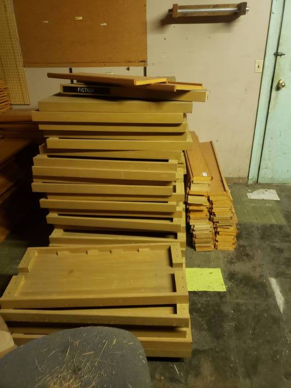 lot 1534 image: HUGE lot of bookshelves lumber