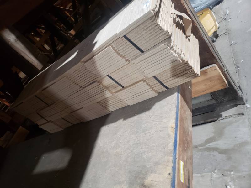 lot 1522 image: Stack of wood siding