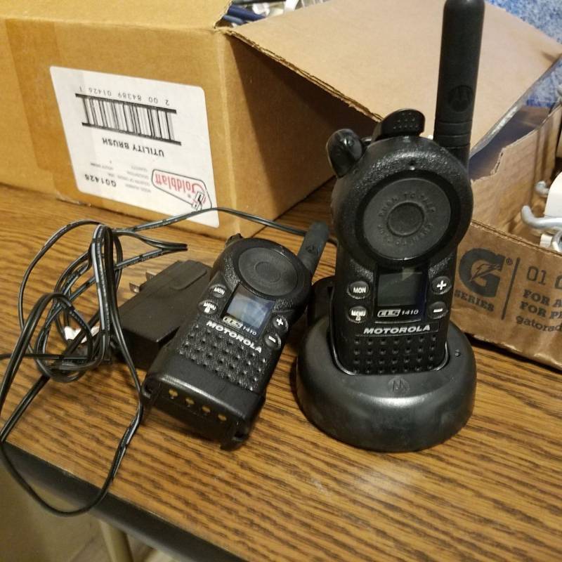 lot 3300 image: Set of Motorola two way radios - CLS 1410 - Both in working condition. Only one charging base.