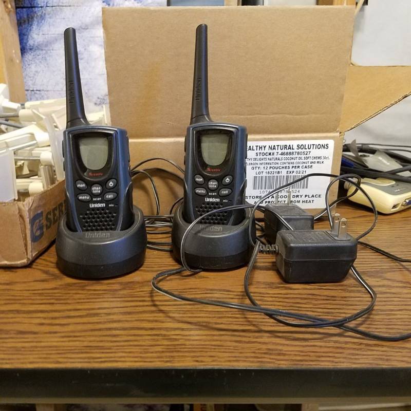 lot 3302 image: Set of two way radios by Uniden both work, one needs new battery. Model# GMR 1048
