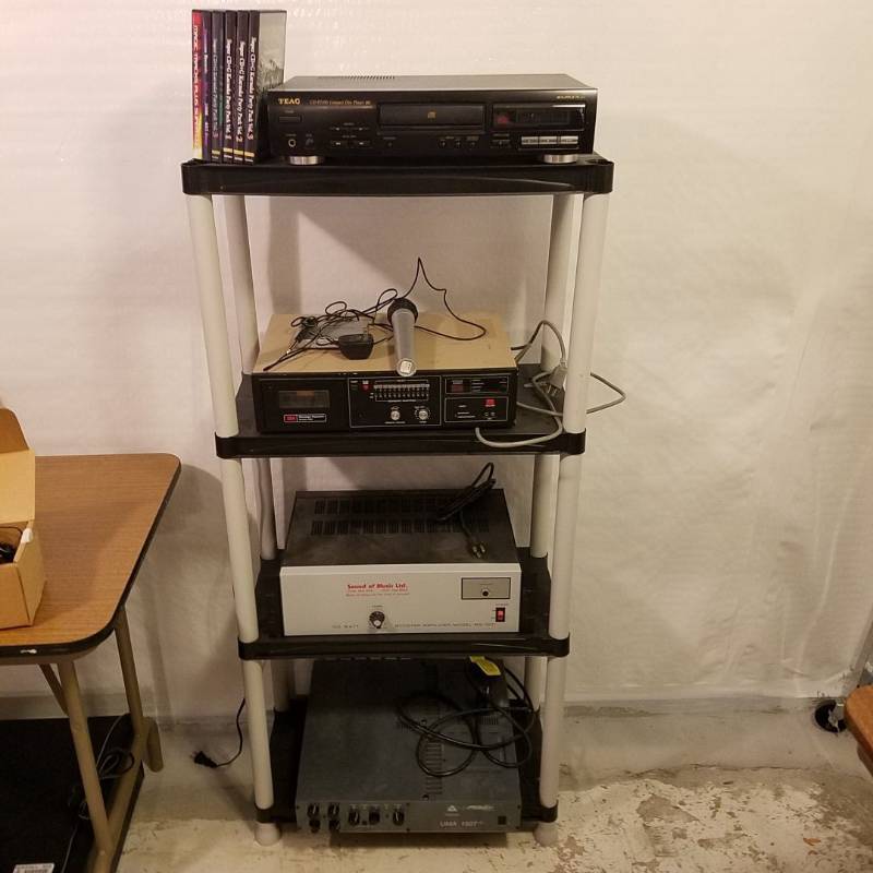 lot 3319 image: Karaoke  DJ equipment on shelf - shelf not included. Teac CD-P1160 CD player, 3M Message Reater Model 456, Sound of Music Booster Amp MS-1001, Peavy Mixer  Amplifer UMA 150T, Memorex Wireless Microphone MKA381