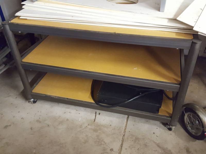 lot 3404 image: Square three tier table on wheels- no contents