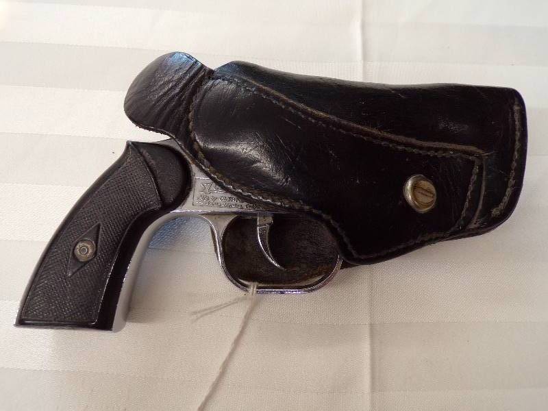 lot 1555 image: CLERKE 1st 32 Cal SW w Holster
