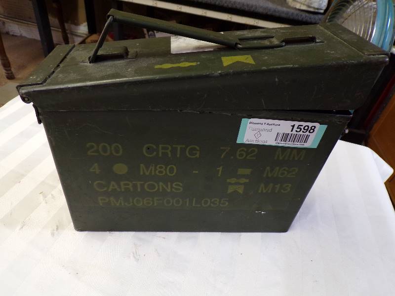 lot 1598 image: Ammo Box just under half full of 22 Cal. Ammo - Bag is Hollow Point