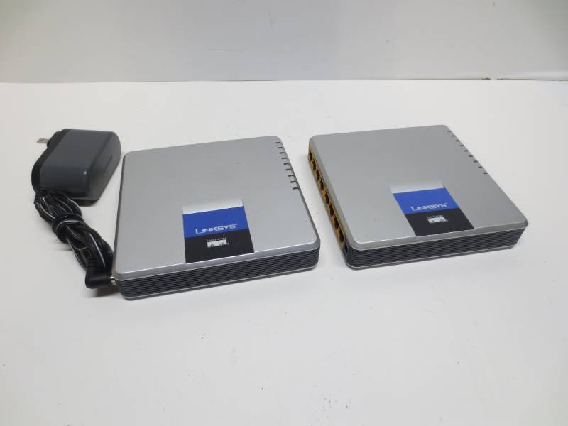 lot 1050 image: Lot of 2 linksys gigabit 8-port switch