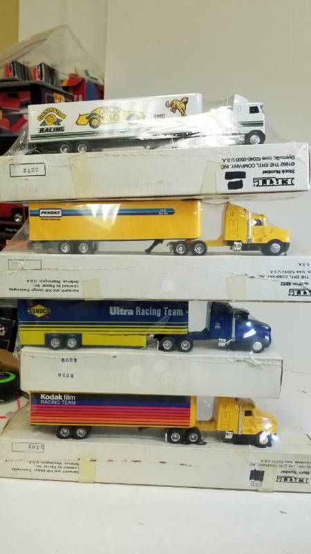 lot 3243 image: 4 Ertl Semi  Kodak Film RacingSunoco Ultra RacingPenske Truck LeasingCountry Time Racing, 164 scale, See PIX, New Box