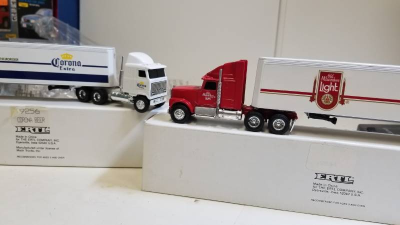 lot 3248 image: 2 ERTL Semi, both 164 scale, 1) CORONA Extra Semi  2) OLD MILWAUKEE LIGHT Semi, NIB