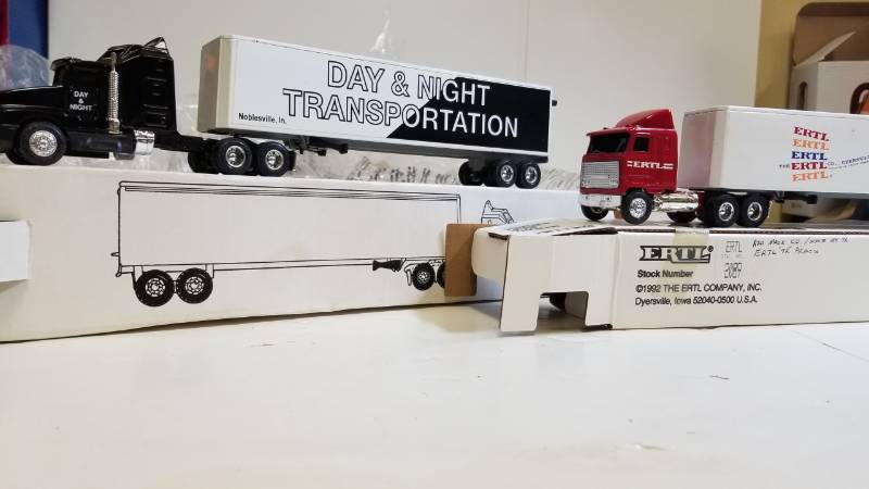 lot 3252 image: 2 ERTL Semi, both 164 scale, 1) DAY & NIGHT TRANSPORTATION Semi  2) ERTL Toys Semi, NIB