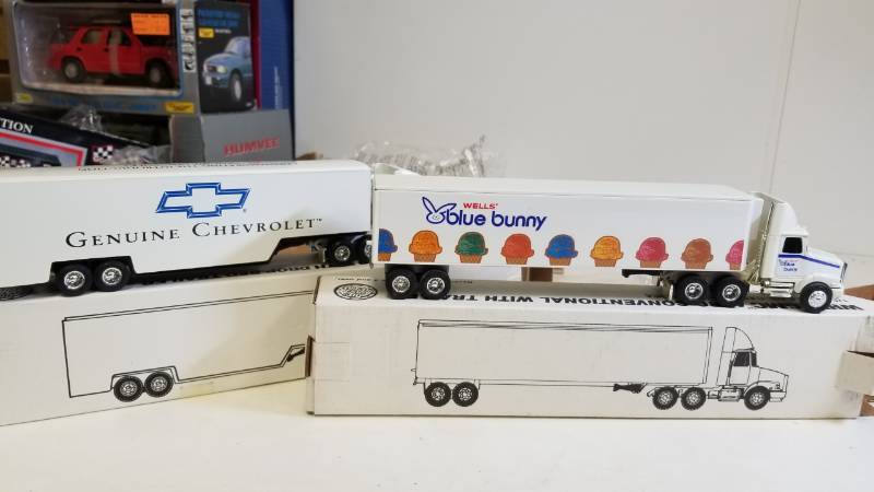 lot 3253 image: 2 ERTL Semi, both 164 scale, 1) BLUE BUNNY (ice cream) Semi  2) GENUINE CHEVROLET Semi, NIB