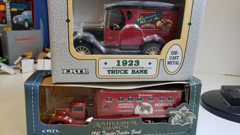 lot 3265 image: 2 Trucks 1923 Bush Truck Bank, 125 scale  1941 Tractor Trailer Bank, 125 scale,, NIB