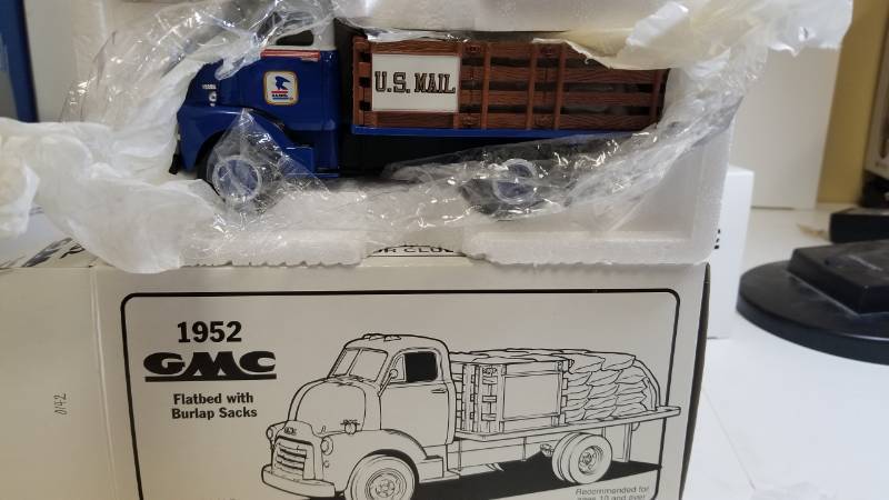 lot 3277 image: First Gear 1952 GMC Flatbed wBurlap Sacks, 134 scale, NIB