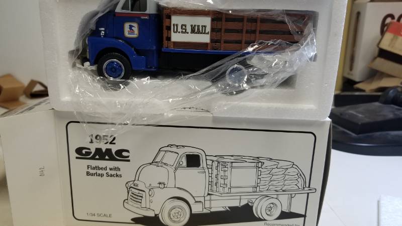 lot 3282 image: First Gear 1952 GMC Flatbed wBurlap Sacks, 134 scale, NIB