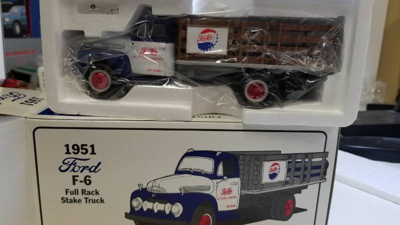 lot 3291 image: First Gear 1951 Ford F-6 Full Rack Stake Truck, 134 scale, new in box, See Pix