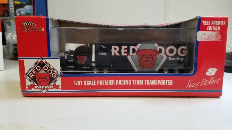 lot 3298 image: Racing Champion Racing Team RED DOG Transporter, 187 scale, new in box, See Pix