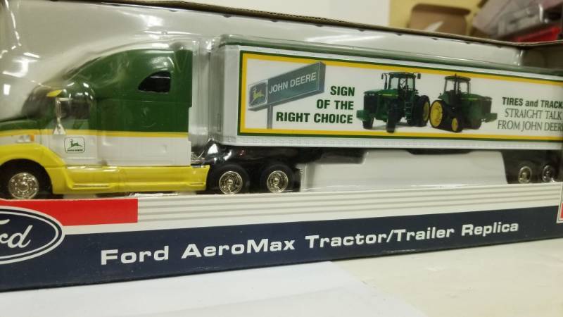 lot 1123 image: John Deere Ford Aeromax Tractor  Trailer By Spec Cast 164th Scale