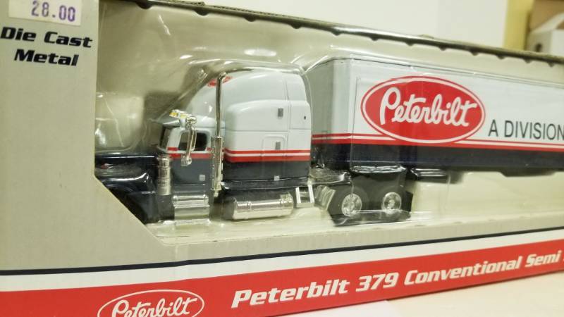 lot 1124 image: Speccast Peterbilt Die Cast Metal 379 Conventional Semi Bank Limited Edition