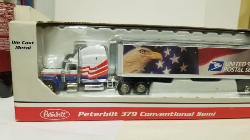 lot 1135 image: USPS Brand Peterblit 379 Conventional Semi Die Cast Metal Trailer