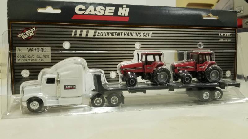 lot 1152 image: Ertl Case Ih Equipment Hauling Set, Die Cast Metal 164 Scale Tractor & Trailer