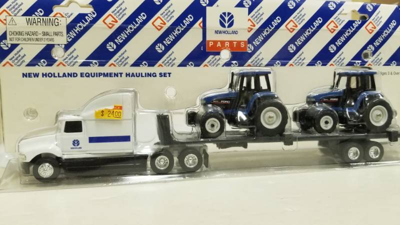 lot 1155 image: Ertl - Holland Equipment Hauling Set - Ford Truck  Trailer 8870 Tractors