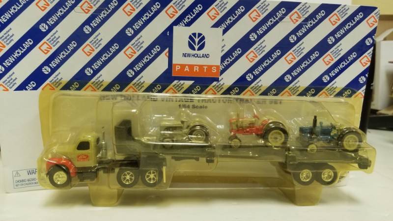 lot 1179 image: New Holland vintage tractor trailer set 1-64th scale ford cab