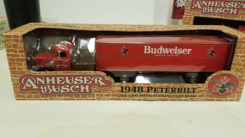 lot 1182 image: Ertl Anheuser Busch Budweiser 1948 Peterbilt Locking Coin Bank In Red