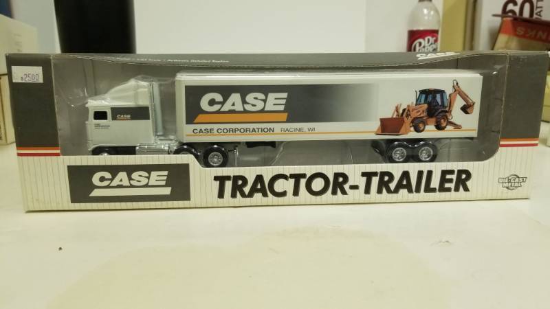lot 1191 image: Case 580l Backhoe Tractor Loader Case Ih 2188 Combine Semi Truck 164 Ertl Toy