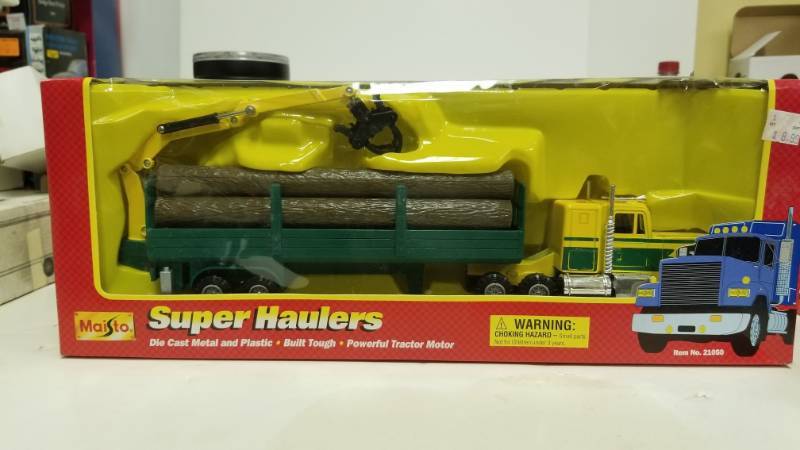 lot 1215 image: Maisto Super Haulers By Mighty Motors Auto Transport Truck 143 Nosmib