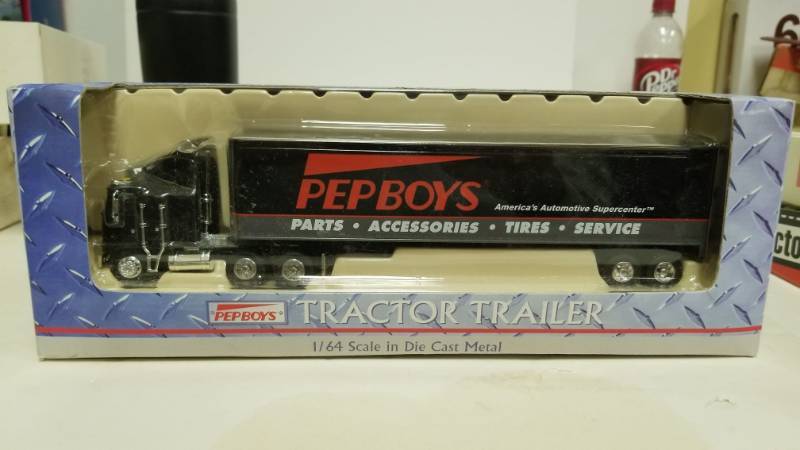 lot 1220 image: Liberty Classics Kentworth 164 Scale Pep Boys Die-cast Tractor Trailer