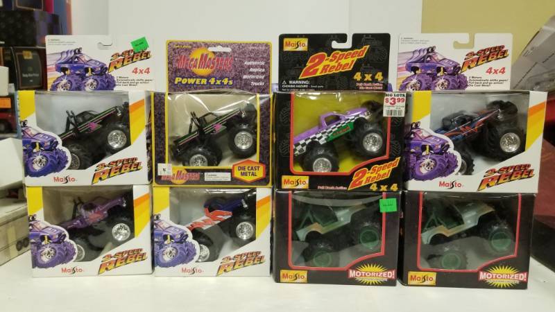 lot 1245 image: Maisto 2 speed rebel & Mega masters power 4x4 10 total trucks