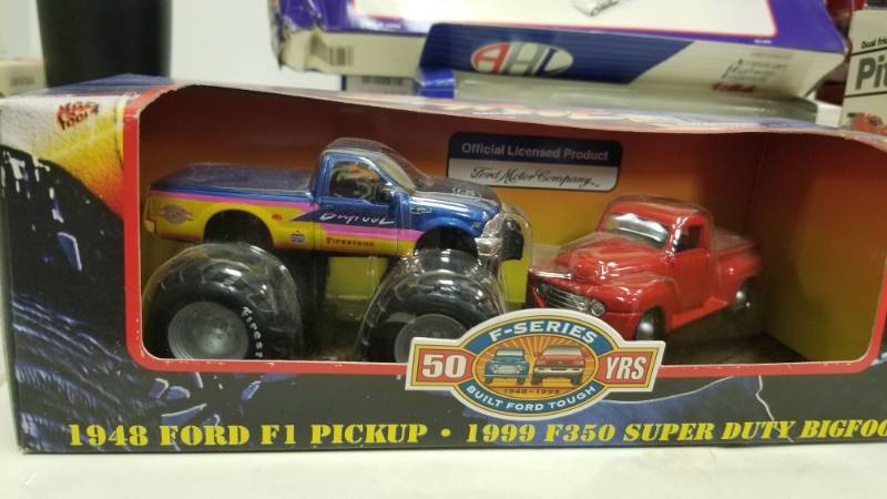 lot 1260 image: 1999 Ford F-350 Super Duty Bigfoot With 1948 F1 Pick Up