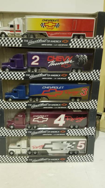 lot 1305 image: Ertl Chevrolet 1994 Transporter Hauler Set of # 1-5 trucks HEAVY