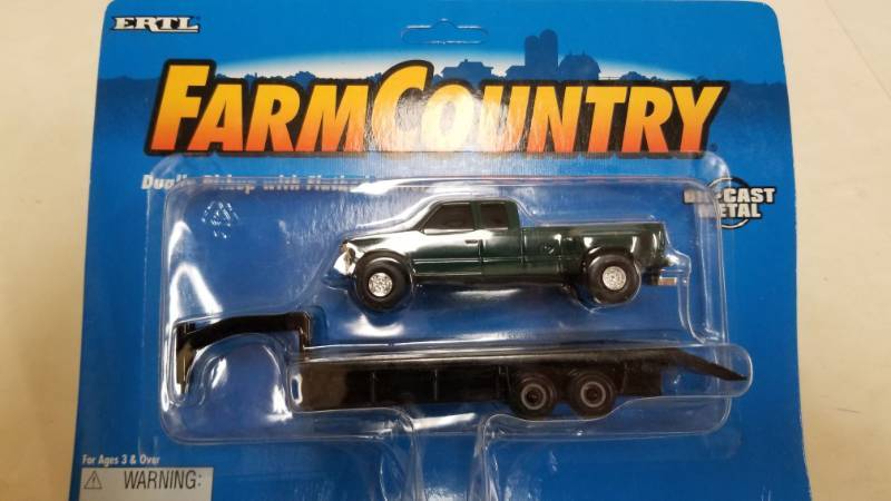 lot 1315 image: Ertl Farm Country Gmc Dually Pickup Truck With Grain Goose Neck Trailer 164 Nip