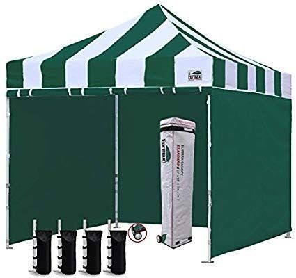 lot 3239 image: Eurmax 10x10 Ez Pop Tent Commercial Instant Canopies with 4 Removable Zipper End Side Walls and Roller Bag Bonus 4 SandBags, 1 sidewalls, St Kelly Green&nbsp