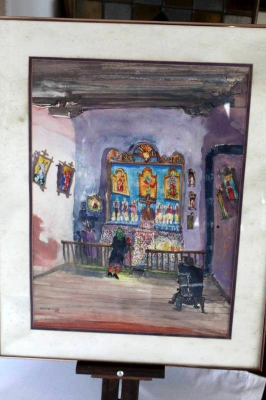 lot 23 image: 1982 Tom Noble - Lady in a Mexican Nicho Shop - signed