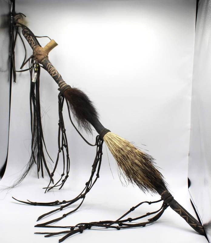 lot 30 image: Native American Carved Stick with Porcupine Quills, bone, fur, horse hair and leather