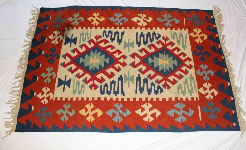 lot 53 image: Native American Rug - rust and blue colored