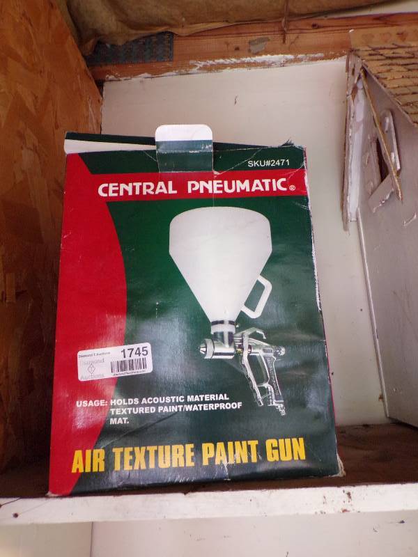lot 1745 image: Texture Gun NIB
