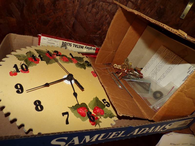 lot 1879 image: Saw Blade Clock and Clock Parts