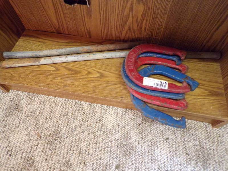lot 1942 image: Throwing Horse Shoes